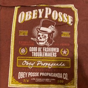 medium obey tee